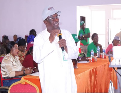 SWEF staff facilitating a community meeting
